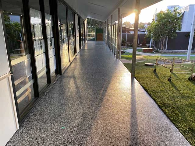 Outdoor walkway after epoxy coating by Tough Floors